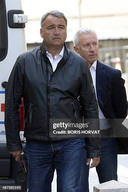 Businessmen Michel Carasco and Jean Trapani arrive at the courthouse in Marseille, on April 29 to be heard as part of an investigation on Alexandre...