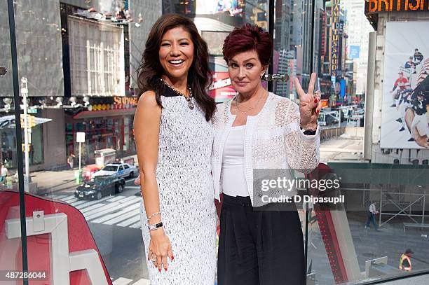Julie Chen and Sharon Osbourne visit "Extra" at their New York studios at H&M in Times Square on September 8, 2015 in New York City.