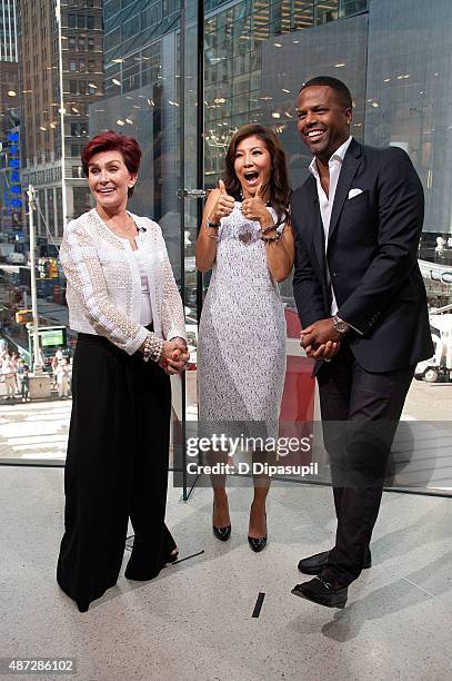 Calloway interviews Julie Chen and Sharon Osbourne during their visit to "Extra" at their New York studios at H&M in Times Square on September 8,...