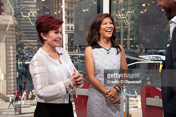 Sharon Osbourne and Julie Chen visit "Extra" at their New York studios at H&M in Times Square on September 8, 2015 in New York City.