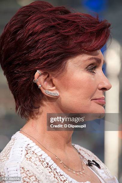 Sharon Osbourne, earring/necklace detail, visits "Extra" at their New York studios at H&M in Times Square on September 8, 2015 in New York City.