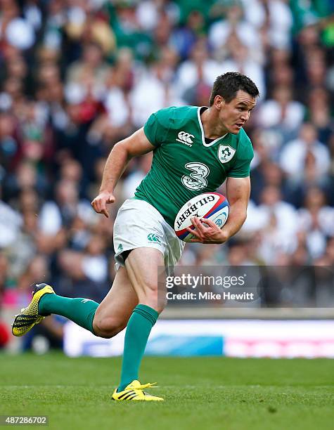 Jonny Sexton of Ireland runs with the ball during the QBE International match between England and Ireland at Twickenham Stadium on September 5, 2015...