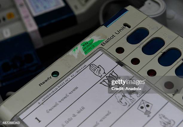 Indian polling officials test the Electronic Voting Machines before the seventh phase of the Indian Election in the Indian state of Gujarat,...