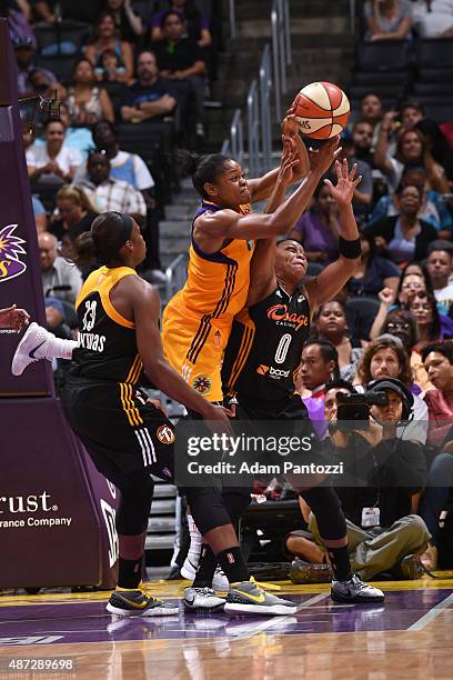 Alana Beard of the Los Angeles Sparks shoots the ball against Odyssey Sims of the Tulsa Shock at STAPLES Center on September 06, 2015 in Los Angeles,...