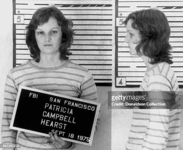 Heiress Patty Hearst poses for an FBI mugshot after her arrest for bank robbery on September 18, 1975 in San Francisco, California.