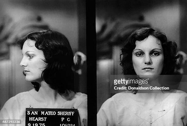 Heiress Patty Hearst poses for a San Mateo Sheriff mugshot after her arrest for bank robbery on September 19, 1975 in San Francisco, California.