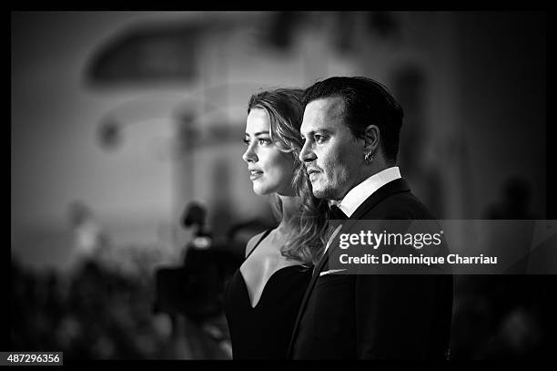 Amber Heard and Johnny Depp attend a premiere for 'Black Mass' during the 72nd Venice Film Festival on September 8, 2015 in Venice, Italy.