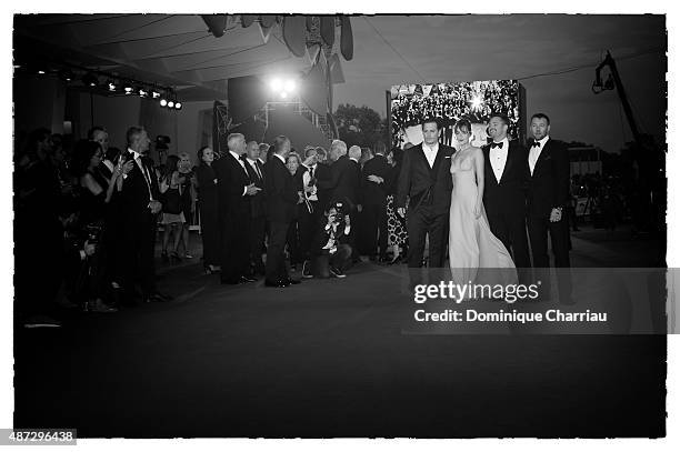 Johnny Depp, Dakota Johnson, Scott Cooper and Joel Edgerton attend a premiere for 'Black Mass' during the 72nd Venice Film Festival on September 8,...