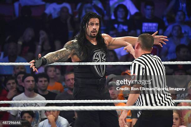 Roman Reigns reacts during the WWE Smackdown on September 1, 2015 at the American Airlines Arena in Miami, Florida.