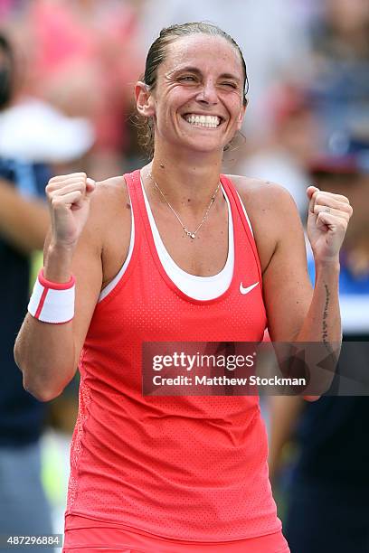 Roberta Vinci of Italy celebrates after defeating Kristina Mladenovic of France in their Women's Singles Quarterfinals Round match on Day Nine of the...