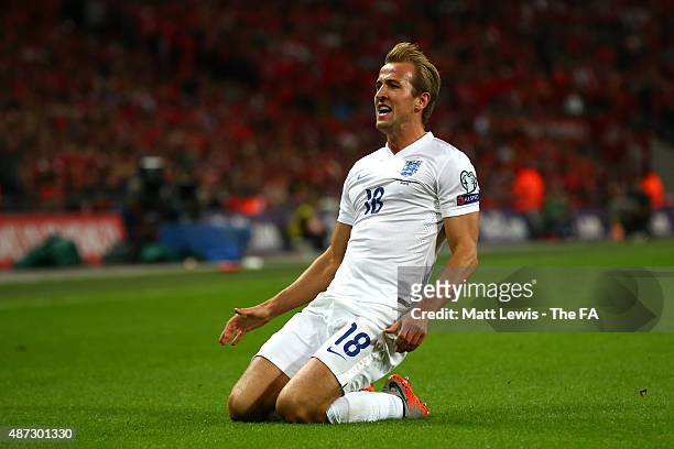 Harry Kane of England celebrates after scoring the opening goal during the UEFA EURO 2016 Qualifier Group E match between England and Switzerland at...
