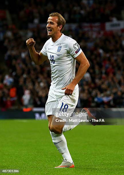 Harry Kane of England celebrates after scoring the opening goal during the UEFA EURO 2016 Qualifier Group E match between England and Switzerland at...