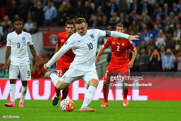 Wayne Rooney of England scores their second goal from the penalty spot during the UEFA EURO 2016 Group E qualifying match between England and...