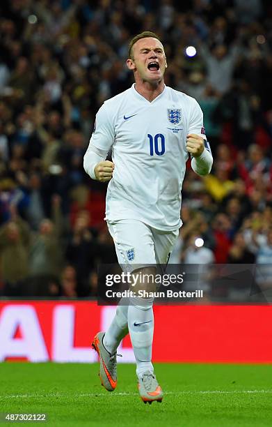 Wayne Rooney of England celebrates scoring their second goal from the penalty spot during the UEFA EURO 2016 Group E qualifying match between England...