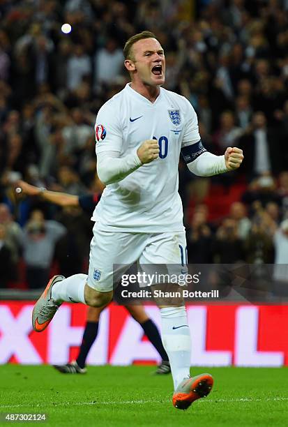 Wayne Rooney of England celebrates scoring their second goal from the penalty spot during the UEFA EURO 2016 Group E qualifying match between England...