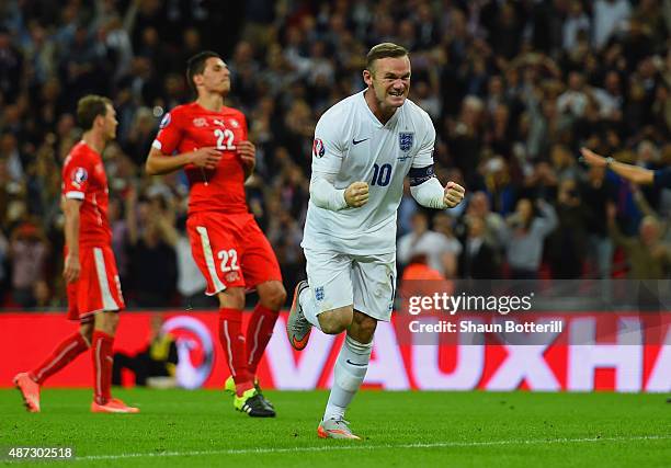 Wayne Rooney of England celebrates scoring their second goal from the penalty spot during the UEFA EURO 2016 Group E qualifying match between England...