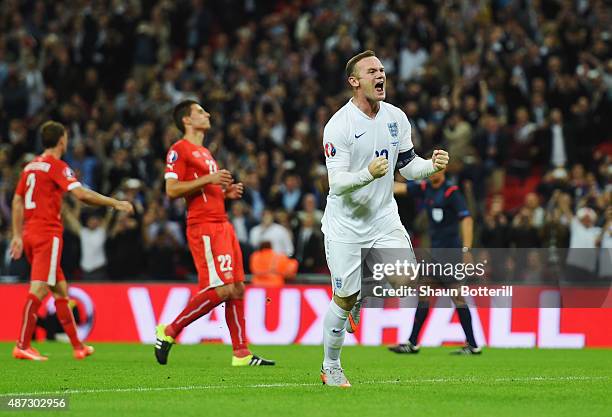 Wayne Rooney of England celebrates scoring their second goal from the penalty spot during the UEFA EURO 2016 Group E qualifying match between England...
