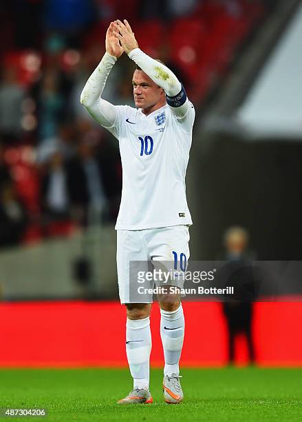Wayne Rooney of England applauds the fans after the UEFA EURO 2016 Group E qualifying match between England and Switzerland at Wembley Stadium on...