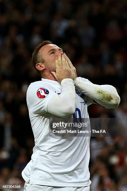 Wayne Rooney of England reacts after scoring his team's second goal breaking the record of 49 goals set by Sir Bobby Charlton during the UEFA EURO...