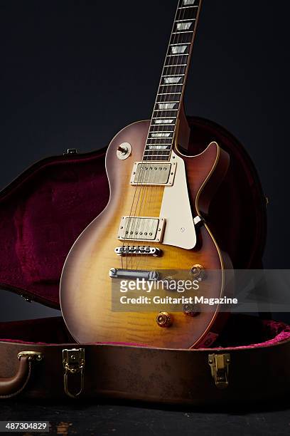 Portrait of a 2013 Gibson Custom 1959 Les Paul Standard Reissue electric guitar photographed in a guitar case, taken on August 5, 2013.