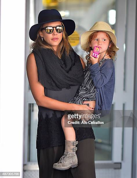 Jessica Alba and Honor Marie Warren are seen at JFK airport on September 8, 2015 in New York City.