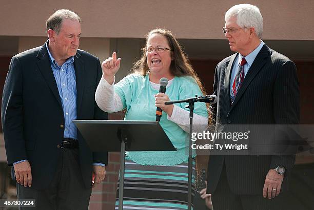Rowan County Clerk of Courts Kim Davis speaks next to her attorney Mat Staver and Republican presidential candidate Mike Huckabee in front of the...