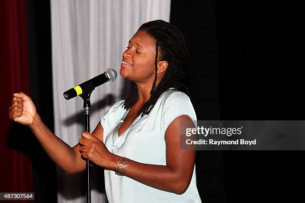 Singer Lizz Wright performs during 'The Experience With Lizz Wright' at the DuSable Museum on September 3, 2015 in Chicago, Illinois.