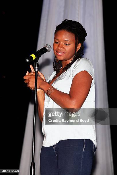 Singer Lizz Wright performs during 'The Experience With Lizz Wright' at the DuSable Museum on September 3, 2015 in Chicago, Illinois.