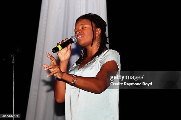 Singer Lizz Wright performs during 'The Experience With Lizz Wright' at the DuSable Museum on September 3, 2015 in Chicago, Illinois.