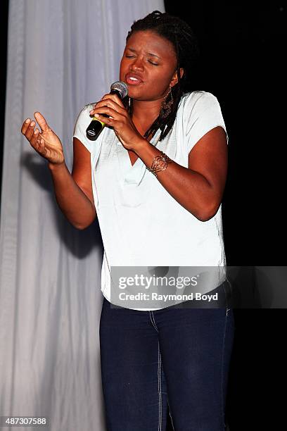 Singer Lizz Wright performs during 'The Experience With Lizz Wright' at the DuSable Museum on September 3, 2015 in Chicago, Illinois.