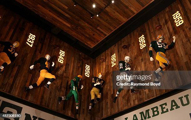 An evolution of Green Bay Packers football uniforms are on display inside the Green Bay Packers 'Hall Of Fame', inside the Lambeau Field atrium on...