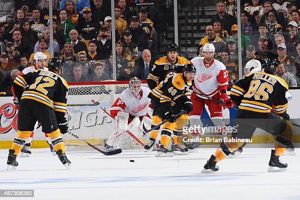 The Boston Bruins against the Detroit Red Wings in Game Five of the First Round of the 2014 Stanley Cup Playoffs at TD Garden on April 26, 2014 in...