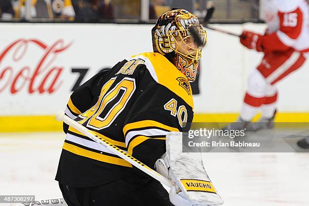 Tuukka Rask of the Boston Bruins watches the incoming puck against the Detroit Red Wings in Game Five of the First Round of the 2014 Stanley Cup...