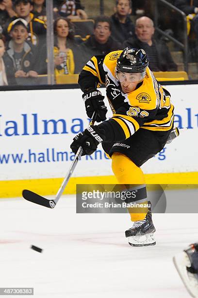 Brad Marchand of the Boston Bruins shoots the puck against the Detroit Red Wings in Game Five of the First Round of the 2014 Stanley Cup Playoffs at...