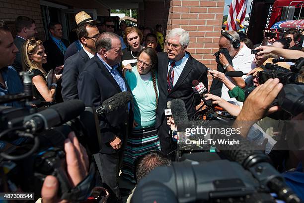 Rowan County Clerk of Courts Kim Davis, attorney Mat Staver and Republican presidential candidate Mike Huckabee address the media in front of the...
