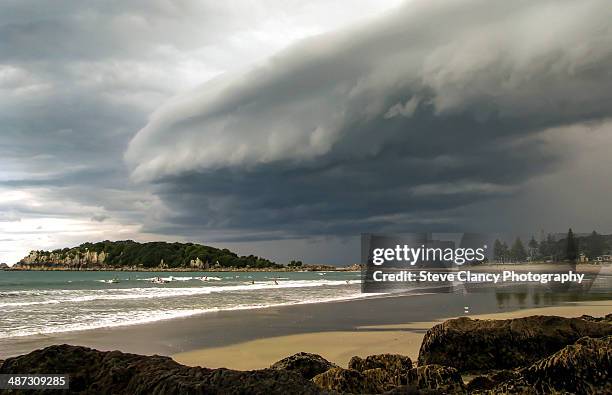 storm approaching - mount maunganui stock pictures, royalty-free photos & images