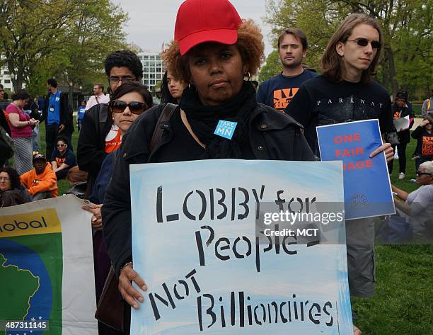 Protestors demonstrate at the U.S. Capitol addressing income inequality, minimum wage and ending tax breaks for wealthy corporations on Monday, April...