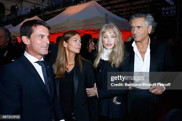 French Prime Minister Manuel Valls and his wife Music Booking of the Opera Anne Gravoin with Stage Director of the Opera Arielle Dombasle and her...