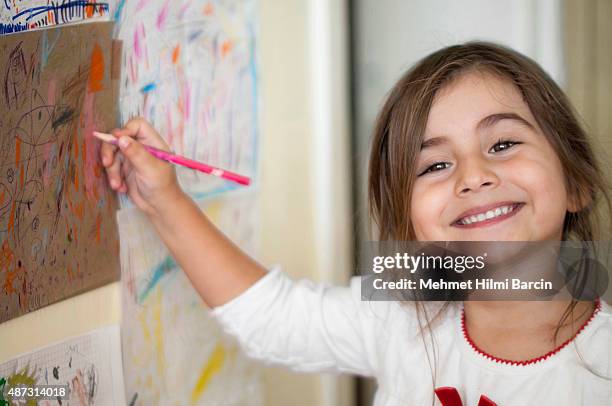 cute turkish girl drawing - brown hair girl stock pictures, royalty-free photos & images