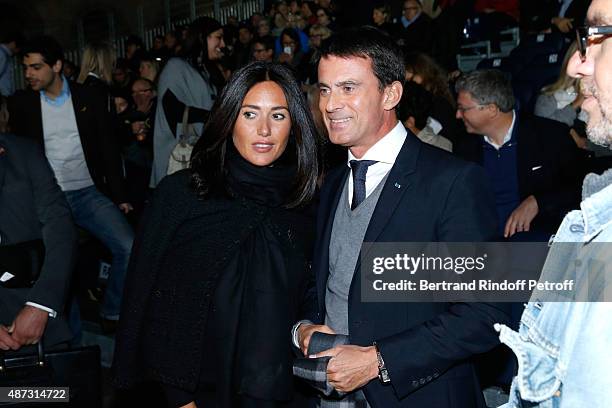 French Prime Minister Manuel Valls poses with a Guest during 'La Traviata' - Opera en Plein Air, produced by Benjamin Patou and 'Moma Event'. Held at...