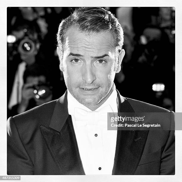 Best Actor Jean Dujardin for the film 'The Artist' poses at the Palme d'Or Winners Photocall at the Palais des Festivals during the 64th Cannes Film...