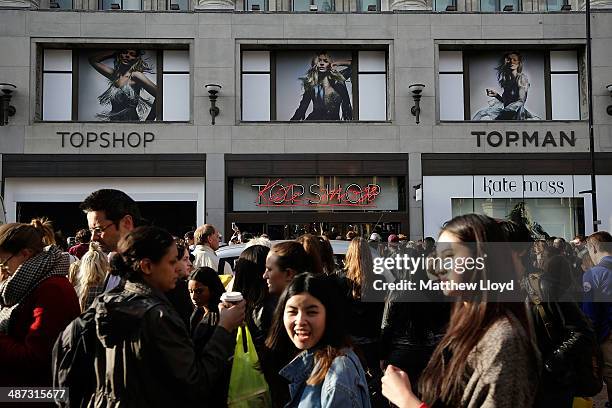 Crowds gather outside the flagship Topshop store on Oxford Circus in anticipation of the launch of Kate Moss' new clothing collection on April 29,...