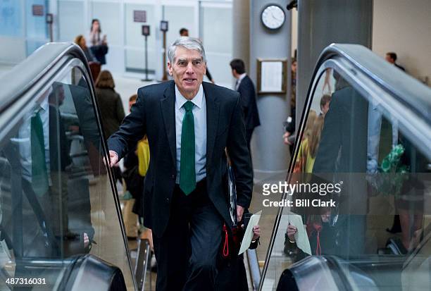 Sen. Mark Udall, D-Colo., arrives in the Capitol for a vote on Tuesday, April 29, 2014.