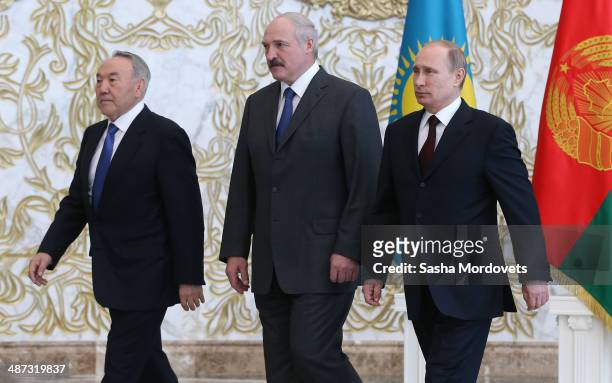 Belarussian President Alexander Lukashenko, Kazakh President Nursultan Nazarbayev and Russian President Vladimir Putin attend a meeting of the...