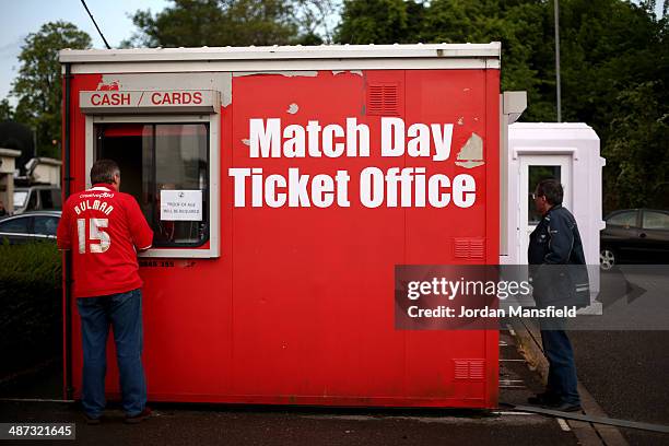 Fans buy tickets from the ticket office ahead of the Sky Bet League One match between Crawley Town and Carlisle United at The Checkatrade.com Stadium...