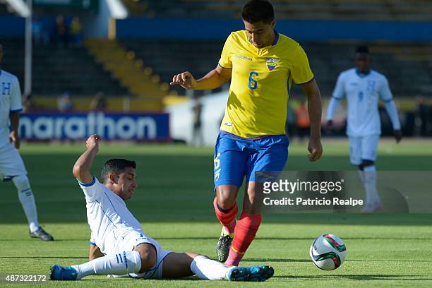 Christian Noboa of Ecuador fights for the ball with Emilio Izaguirre of Honduras during a friendly match between Ecuador and Honduras at Olímpico...