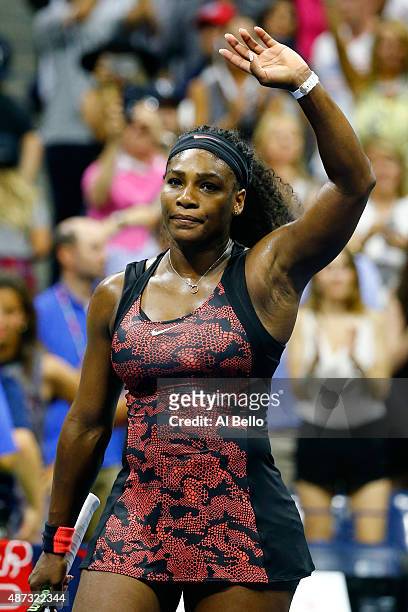 Serena Williams of the United States waves to the crowd after defeating Venus Williams of the United States in their Women's Singles Quarterfinals...