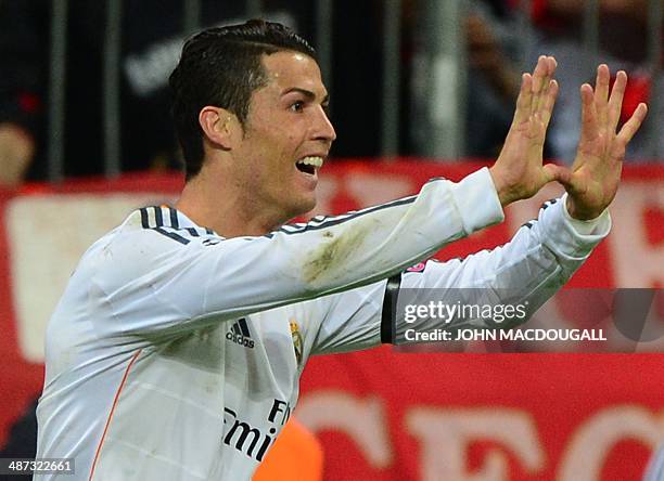 Real Madrid's Portuguese forward Cristiano Ronaldo celebrates scoring the 0-3 and breaking the record for the most goals in a European Cup or...