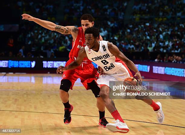 Mexico´s Juan Toscano vies for the ball with Andrew Wiggins of Canada, during their 2015 FIBA Americas Championship Men's Olympic qualifying match at...