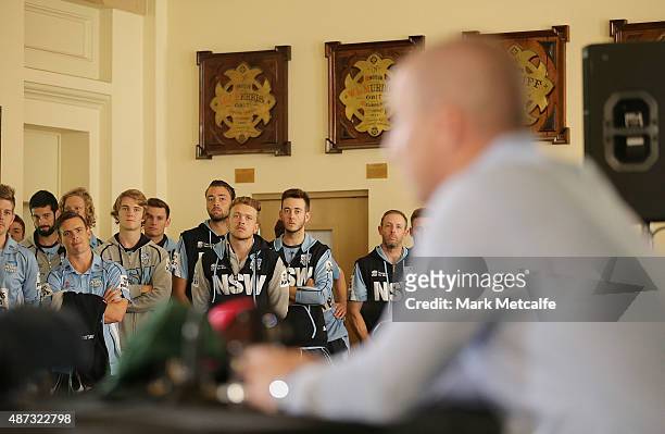 Cricketers watch Brad Haddin as he announces his retirement from cricket during a press confrerence at Sydney Cricket Ground on September 9, 2015 in...